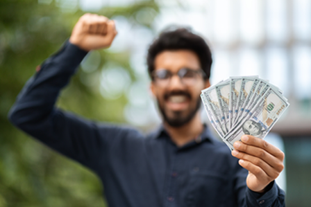 man holding money